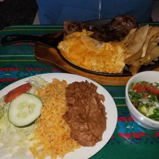 Beef fajitas with all the fixins ane sides