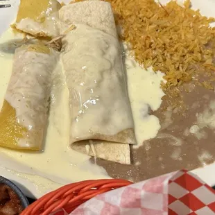 Chicken Burrito and Enchilada, Rice and Beans.
