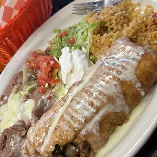 Fajita beef Chimichanga I took a bite out of. Lol.