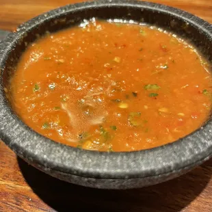 a bowl of soup on a table