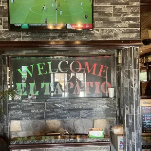 a soccer game on a tv screen