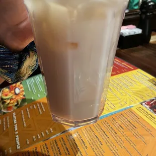 a drink in a tall glass