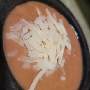 Warm refried beans to dip your chips