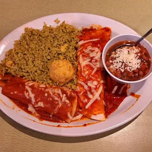 What a great 2 item combo:  burrito and enchilada with shredded chicken, cilantro rice, pinto beans, and a dollop of tasty Mexican corn pie