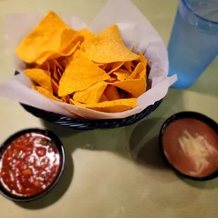 Complimentary chips and salsa and bean dip