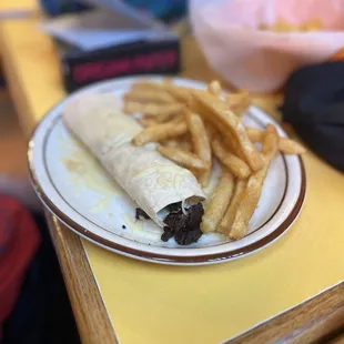 Kids steak burrito with French fries. They LOVE IT