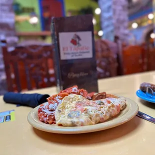 a plate of pizza on a table