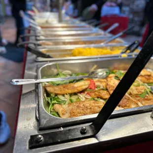 food being served at a buffet
