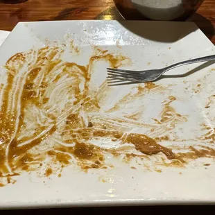 a dirty plate of food