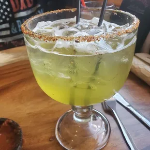 Medium house marg on rocks with Tajin rim. $13!! 32oz. Best marg deal around.