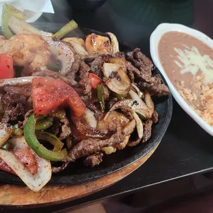 Steak and Shrimp Fajitas refried beans and rice