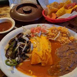 Fajita beef, cheese enchiladas, beans, rice. So good