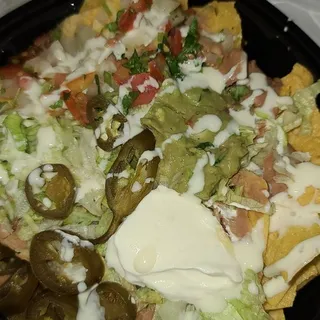 Chicken, Beef or Carnitas Nachos Tapatios