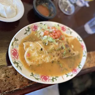 shredded beef burrito smothered in green chili no added cheese