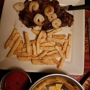 Steak with shrimp and fries