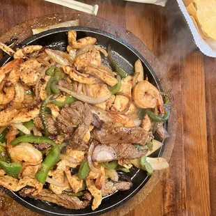 Chicken, Steak &amp; Shrimp, vegetables and a lot of flavor.