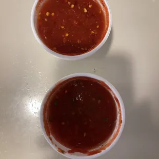 Hot salsa on top and regular salsa at bottom - both fantastic. Comes with chips