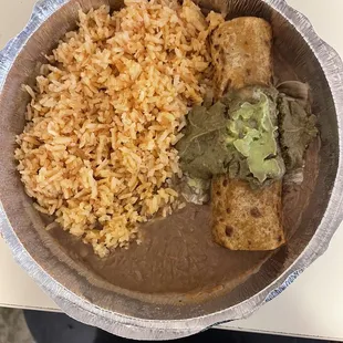 Ground beef corn flauta, with avocado, rice an beans