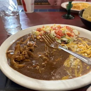 Gross brown sweet mole. No spices or complexities. Please get a new mole recipe or at least something not from the can