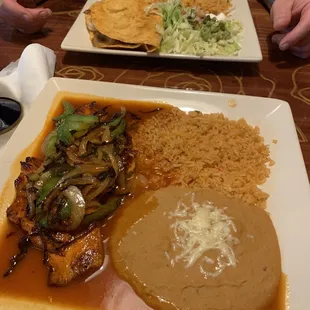 two plates of mexican food