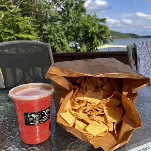 a bag of chips and a drink