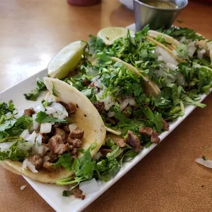Must try STREET TACOS !   I'm from California and it's the closest to our track truck style. Love it!   Great atmosphere
