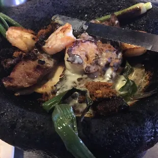 Molcajete! Steak, chicken and shrimp. In a pestle!