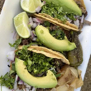 Lengua and carne asada tacos