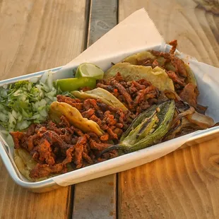 $1.25 tacos al pastor every Tuesday and Wednesday!
