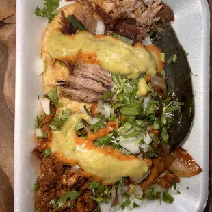 Pastor and carnitas tacos