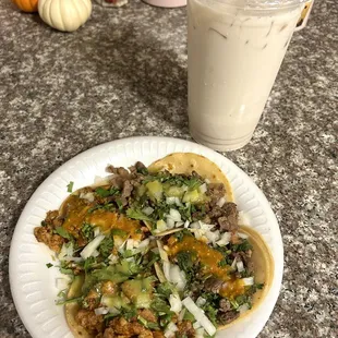 2 al pastor and 2 carne asada tacos with a large horchata.