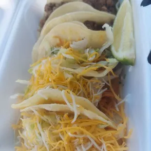 a close up of a taco in a styrofoam container