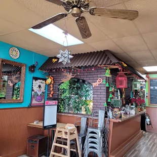 the interior of a mexican restaurant