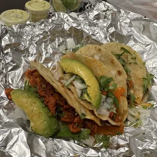 Al pastor tacos with avocado