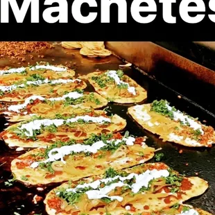 Machetes corn hand made tortilla with mozzarella cheese grilled onions meat cilantro sour cream and fold