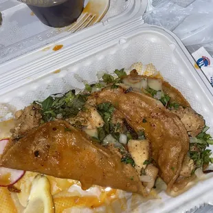 Chicken quesa birria tacos.