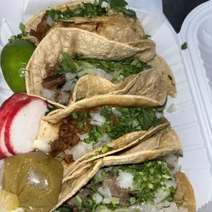 Al pastor and carnitas tacos