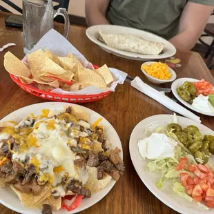 Beef fajita nachos, burrito supreme.