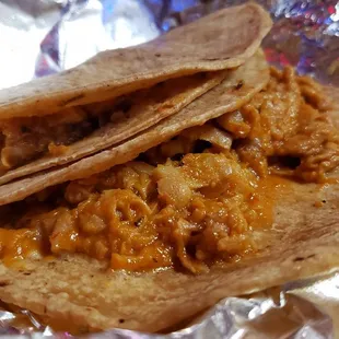 Vegan soy chicken tinga tacos ($3 each). Nicely flavored tinga. Taco shell seems store-bought, but was fine.