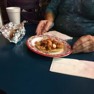 Shrimp and octopus ceviche tostada