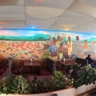 The mural along one wall.