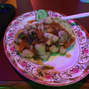 An octopus ceviche tostada.