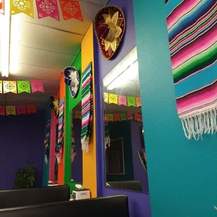 a brightly colored mexican bathroom