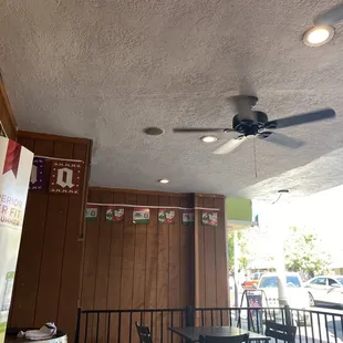 a ceiling fan in a restaurant