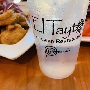 a plastic cup with a drink in it