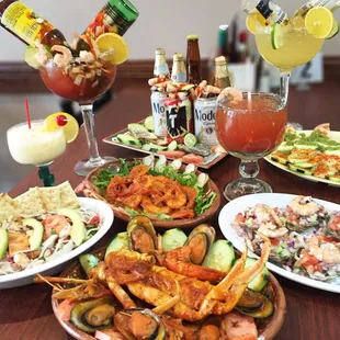 a table full of food and drinks