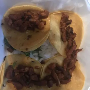 Mini tacos 6.99 + tax comes with charro beans and jalapeño. Missing my jalapeño:(