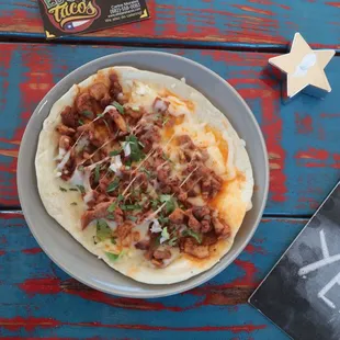 Al Pastor Pork on Flour Tortilla with melted Cheese