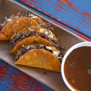 3 Quesa Tacos &amp; consome Special- 3 Quesa tacos, side order of consome. Topped with onions and cilantro.