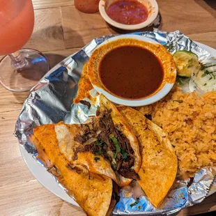 Can't go wrong with birria tacos and a strawberry margarita